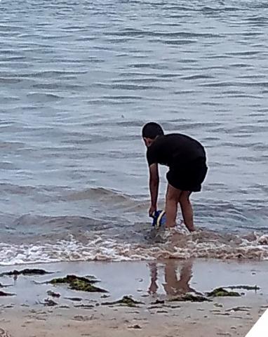 boy paddling