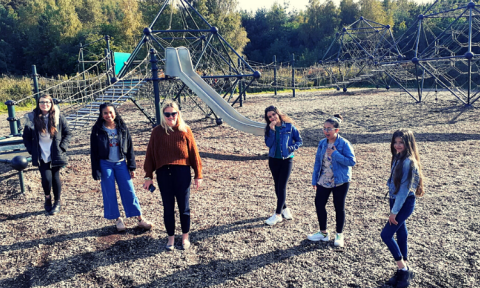 group of young people in park